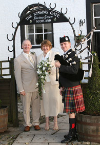 Mr & Mrs Kilby with John the piper, 28th October 2007